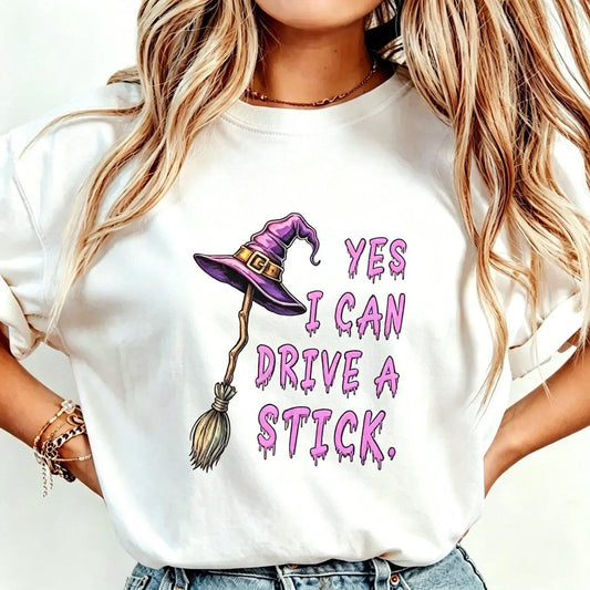 Women's Short-Sleeve Graphic Tee - Cotton Feel, Funny Quote "Yes I Can Drive A Stick", Witch Hat Halloween Print, Casual Stylish Summer Women's Tops
